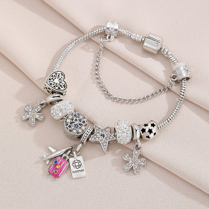 Wanderlust Charm Bracelet | Together against Breast Cancer